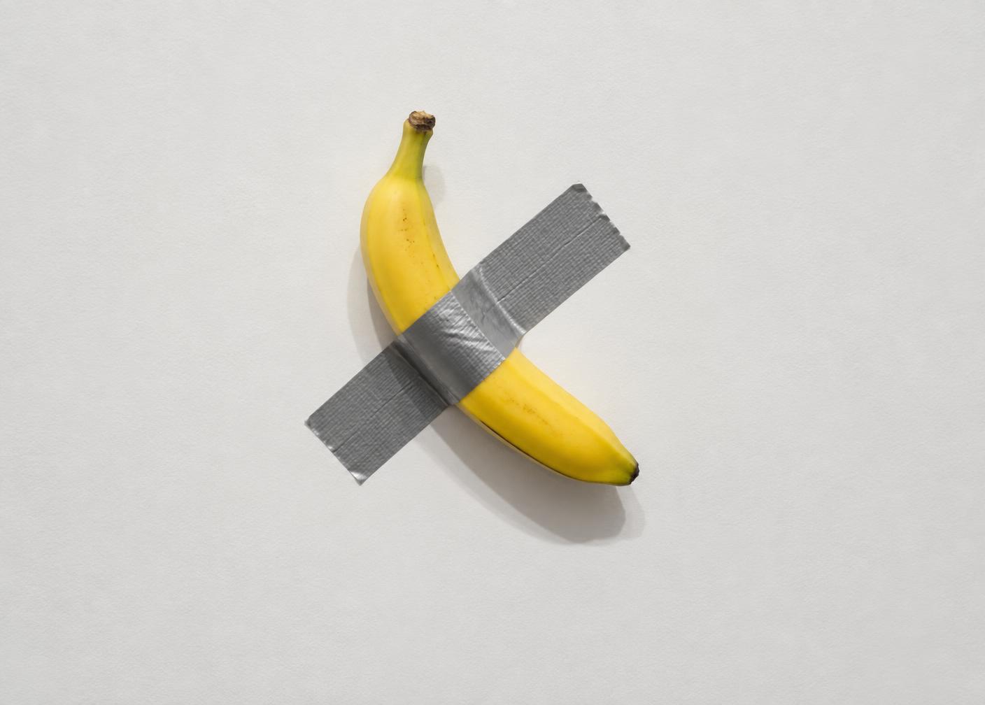A banana duct taped to a clean gallery wall as a conceptual art reference